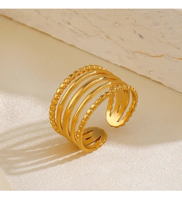 Macro view of five-layer 18K gold plated stainless steel ring with beaded texture
