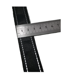 Detail showing 25mm black woven strap width for pet bat wings costume with steel ruler