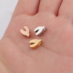 Mirror polished stainless steel wishbone beads in rose gold, silver, and gold finish
