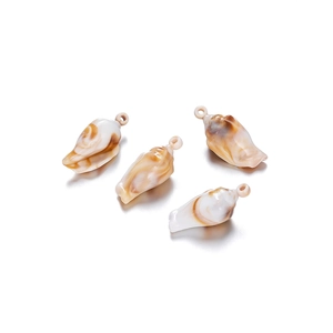 Macro detail of acrylic seashell pendants with white and brown natural textures
