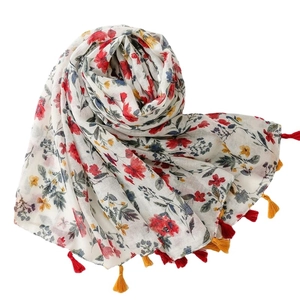 Elegant floral cotton-linen scarf with red flower print and colorful fringe tassels