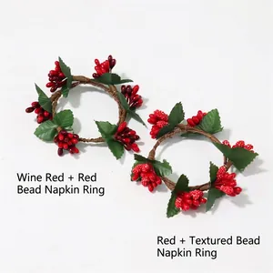 Christmas mini red berry napkin rings with green leaves on brown vine base decoration