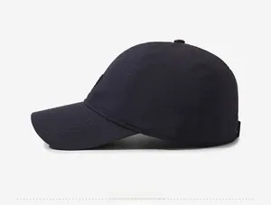 Side view of dark blue breathable quick-dry baseball cap with laser-cut ventilation holes
