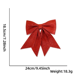 Detailed view of red glitter Christmas bow ornament with 24cm width and 18.5cm height dimensions