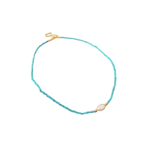 Minimalist blue bead necklace with a baroque freshwater pearl and golden clasp jewelry