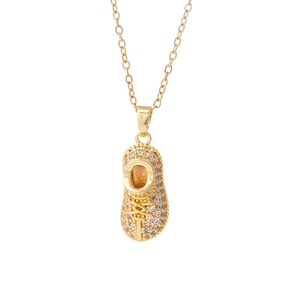 Chic gold-plated boot pendant necklace paved with sparkling rhinestones on a fine chain