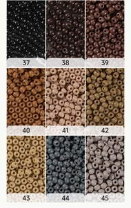 Macro shot of 4mm glass seed beads in a 3x3 grid showing nine earthy color variants