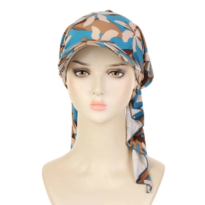 Detail of camouflage patterned headscarf with brim and long ties in blue and beige