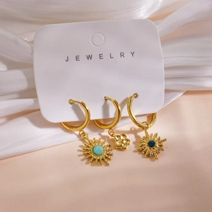 Detail of 14K gold plated earrings set with natural stone charms and 5.2g weight