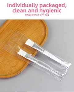 Face mask brushes with soft white bristles in individual OPP hygienic packaging