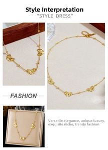 Close-up of golden stainless steel chain featuring three brushed bow pendants and metal beads