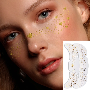 Waterproof gold glitter face stickers featuring heart and star patterns for party makeup