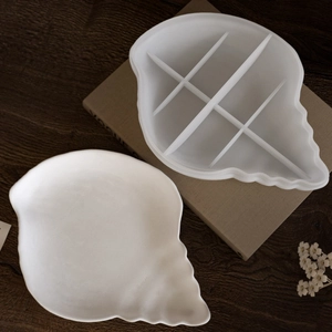 Conch shell silicone molds for resin DIY jewelry boxes and candle holders on wooden desk