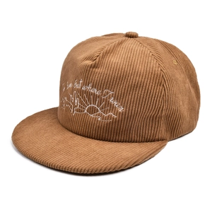 Close-up of cactus embroidery and white lettering on brown corduroy baseball cap