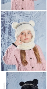 Detail of white faux fur winter hat with bear ears and knitted ear protection for kids