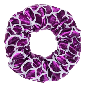 Close-up of fabric hair scrunchie featuring shiny purple fish scale patterns and white lines