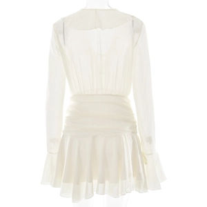 Rear view of white long-sleeved V-neck chiffon dress with ruched waist and ruffled hemline