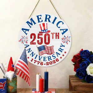 Wooden America 250th Anniversary round door sign with red, white and blue flag design