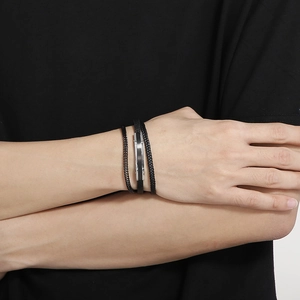 Men's multilayer black braided leather bracelet with silver metal plate on male wrist