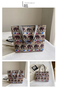 Detail view of ethnic elephant embroidery on large bohemian canvas tote bag for women