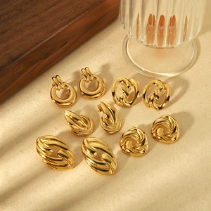 Set of minimalist geometric gold stainless steel earrings with vintage textured designs