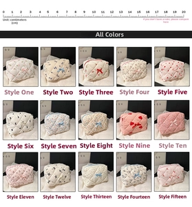Detailed grid view of 15 patterned quilted cotton makeup bags with bow details