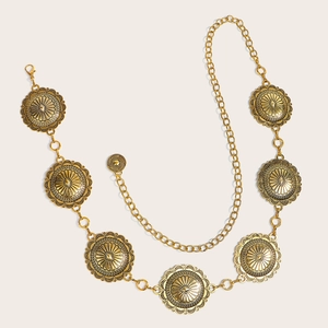 Detailed view of vintage gold alloy waist chain with engraved circular discs and lobster clasp