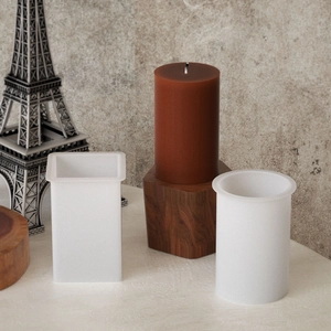 DIY silicone molds for candle making with textures and finished cylinder candle display