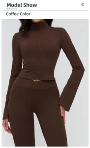 Detail of coffee brown yoga jacket featuring standing collar and smooth zipper closure