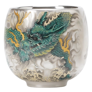 Exquisite silver-plated tea cup featuring a detailed Chinese dragon design on white background