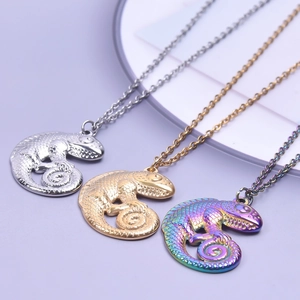 Lizard pendant necklaces in gold, silver, and rainbow finishes with textured scales