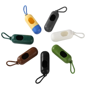 Detailed view of capsule-shaped dog waste bag dispensers in seven vibrant colors