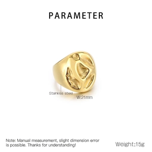 Detail view of 21mm wide gold stainless steel ring with irregular lava texture