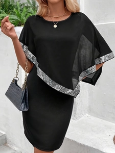 Elegant black dress with silver sequined sheer cape overlay for casual vacation wear