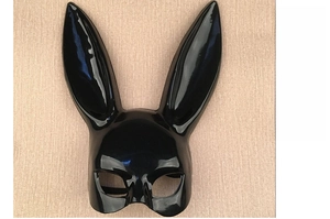 Close-up of a glossy black bunny ear mask with a smooth, high-shine finish for parties