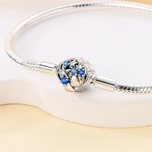 Silver snake chain bracelet with blue faceted gemstone and clear crystals bead charm