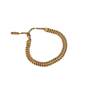 Minimalist gold wheat chain necklace with adjustable lobster clasp on white background