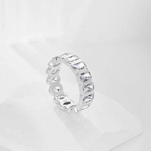 Detail of S925 sterling silver eternity ring with sparkling rectangular zircon stones