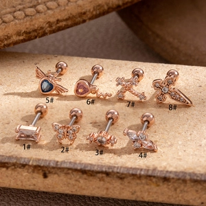 Rose gold stainless steel stud earrings set with heart, snake, and butterfly designs
