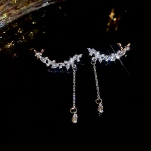 Elegant silver leaf tassel earrings with sparkling rhinestones and teardrop crystal drops