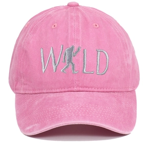 Detail of pink washed cotton baseball cap featuring silver WILD Bigfoot embroidery
