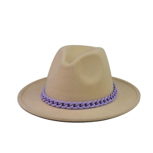 Close-up of flat top wool fedora hat in beige featuring a chunky light purple chain detail