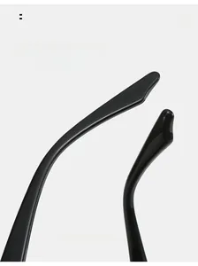 Detail of ergonomic curved black sunglass legs designed for maximum wearing comfort