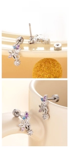 Detailed view of flower butterfly zircon earrings with secure screw-on back closures