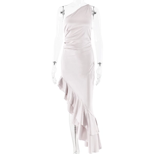 Detail of light pink satin dress with one-shoulder design and ruffled asymmetric hemline