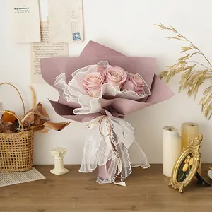 Elegant Korean style purple rose bouquet wrapped in wave pattern pearl tulle and lace