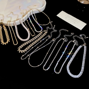 Detailed view of assorted sparkling zircon bracelets in gold and silver finishes