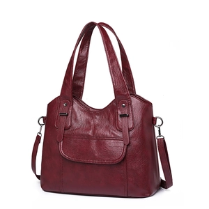 Deep red soft leather tote bag for women with top handles and adjustable shoulder strap