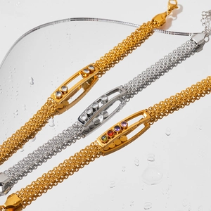 Eleganti bracciali regolabili oro e argento con zirconi colorati e design a fascia larga