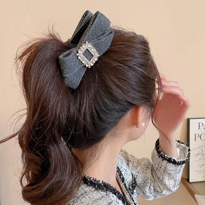 Elegant grey fabric bow hair claw with sparkling rhinestone square buckle for women